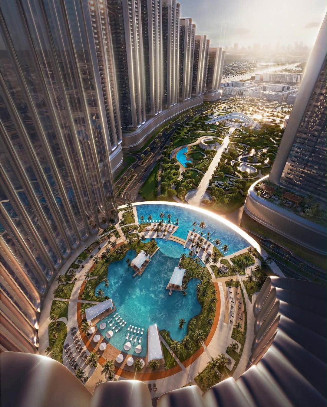 Sculpted pool and landscaped gardens at Mercedes-Benz Places Binghatti City